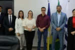 Oficiais da SSP/TO e Sinesp discutindo integração de dados em reunião sobre segurança pública no Tocantins.