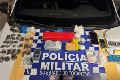 Material apreendido pela Polícia Militar em Gurupi, incluindo drogas, munições e balanças de precisão.