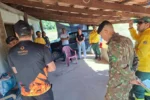 Mobilização da Polícia Civil e órgãos parceiros em Conceição do Tocantins para prevenir queimadas, com agentes orientando moradores rurais.